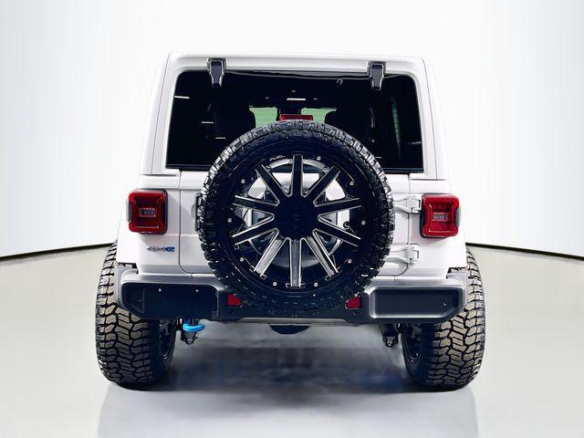used 2024 Jeep Wrangler 4xe car, priced at $33,897