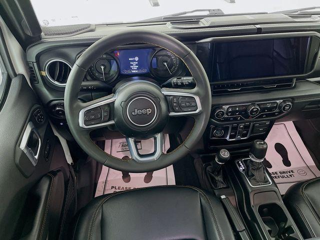 used 2024 Jeep Wrangler 4xe car, priced at $35,897