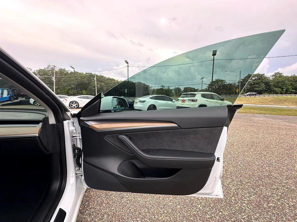 used 2021 Tesla Model 3 car, priced at $29,900