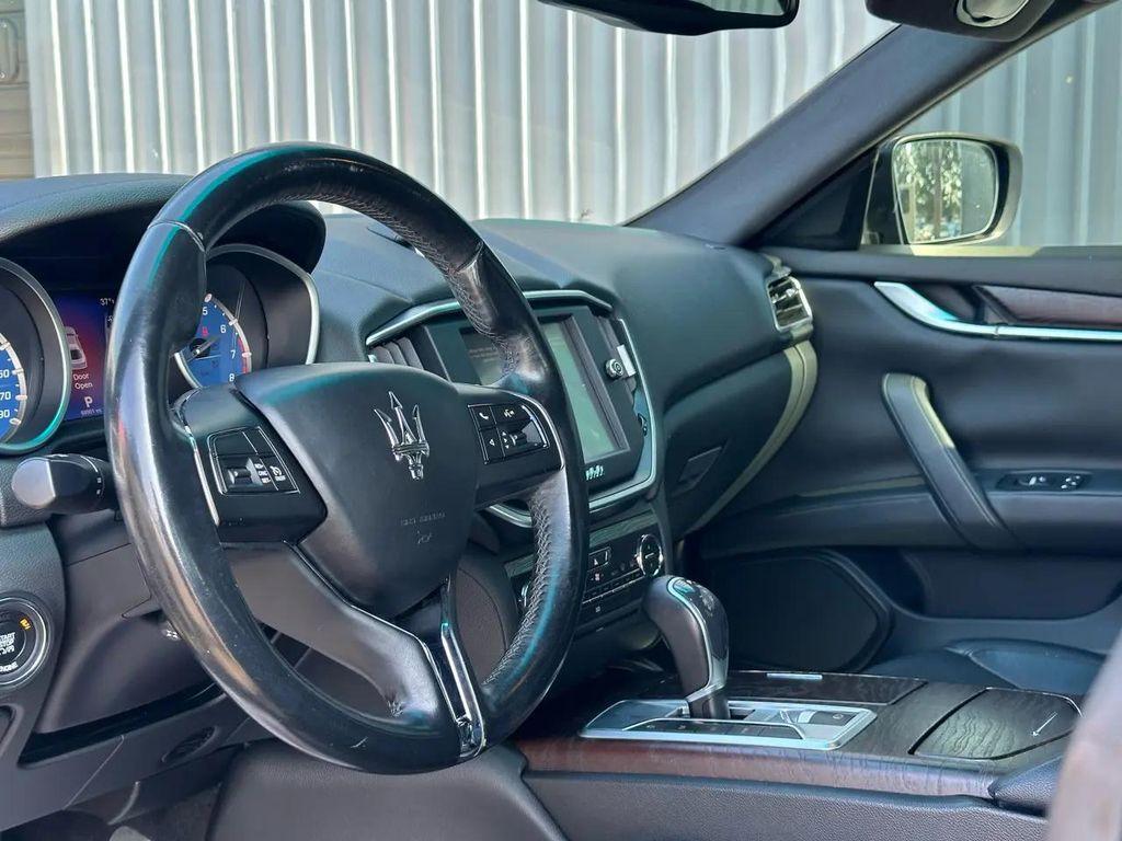 used 2014 Maserati Ghibli car, priced at $17,900