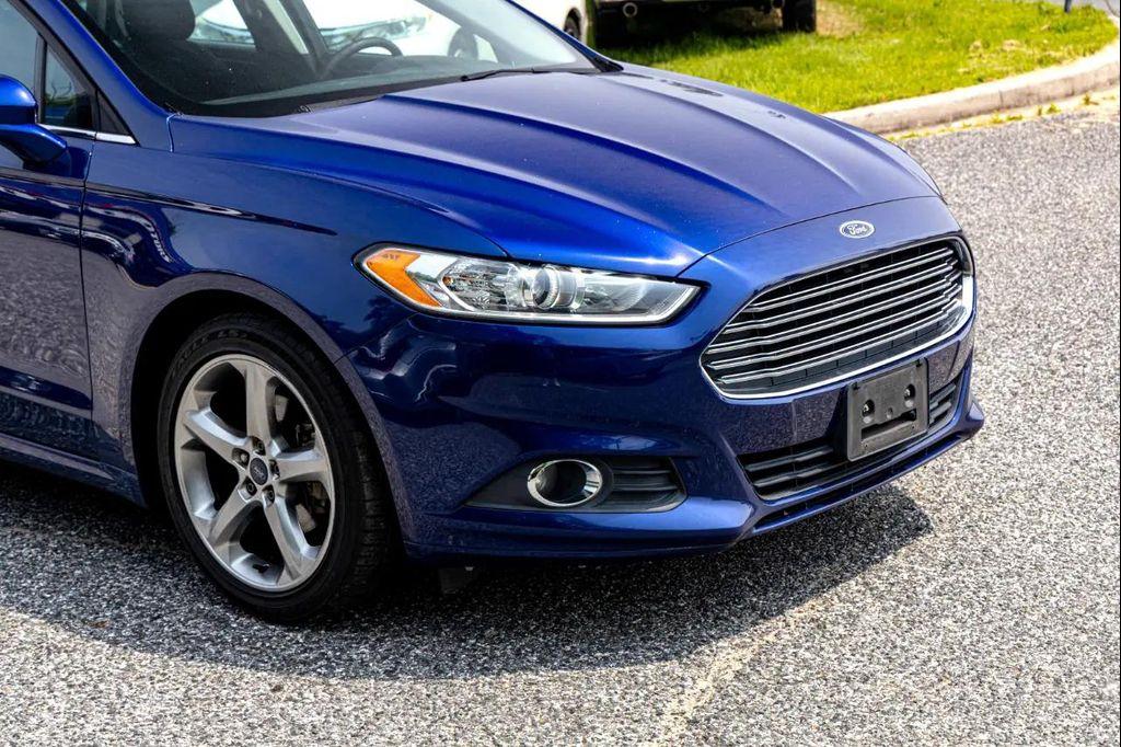 used 2015 Ford Fusion car, priced at $8,900