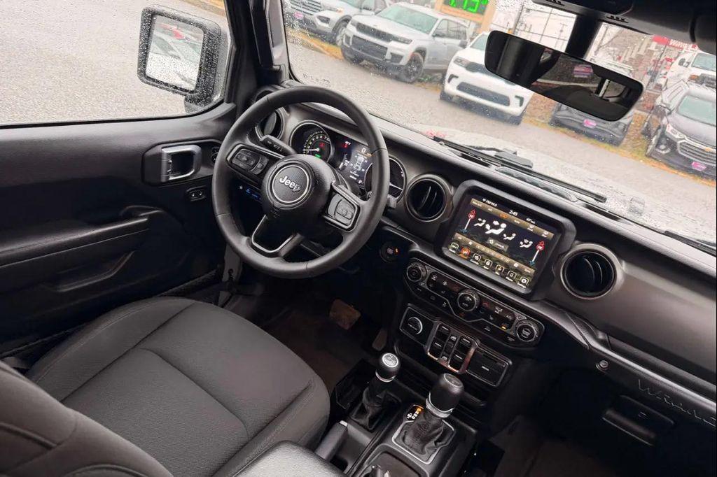 used 2023 Jeep Wrangler 4xe car, priced at $24,200