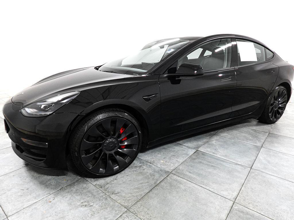 used 2023 Tesla Model 3 car, priced at $31,900