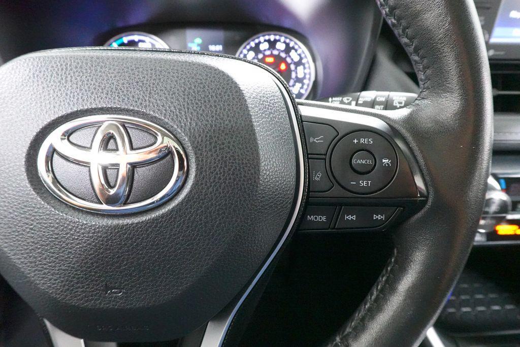 used 2021 Toyota RAV4 Hybrid car, priced at $27,181