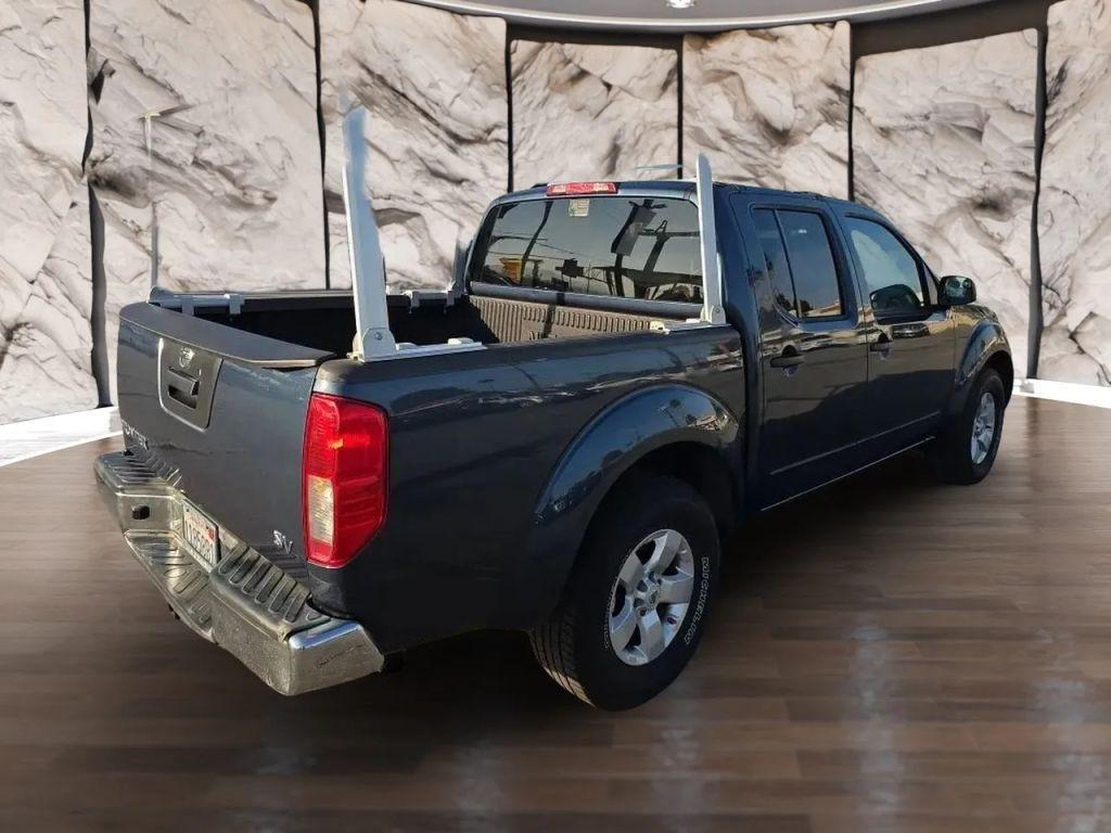 used 2013 Nissan Frontier car, priced at $16,990