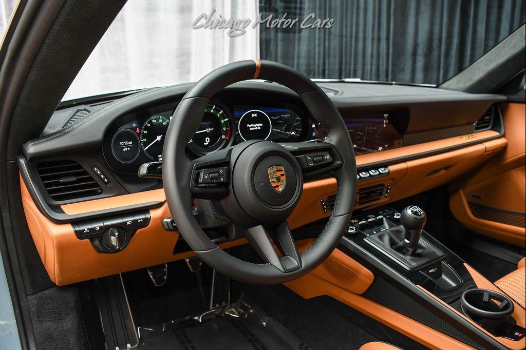 used 2024 Porsche 911 car, priced at $699,800