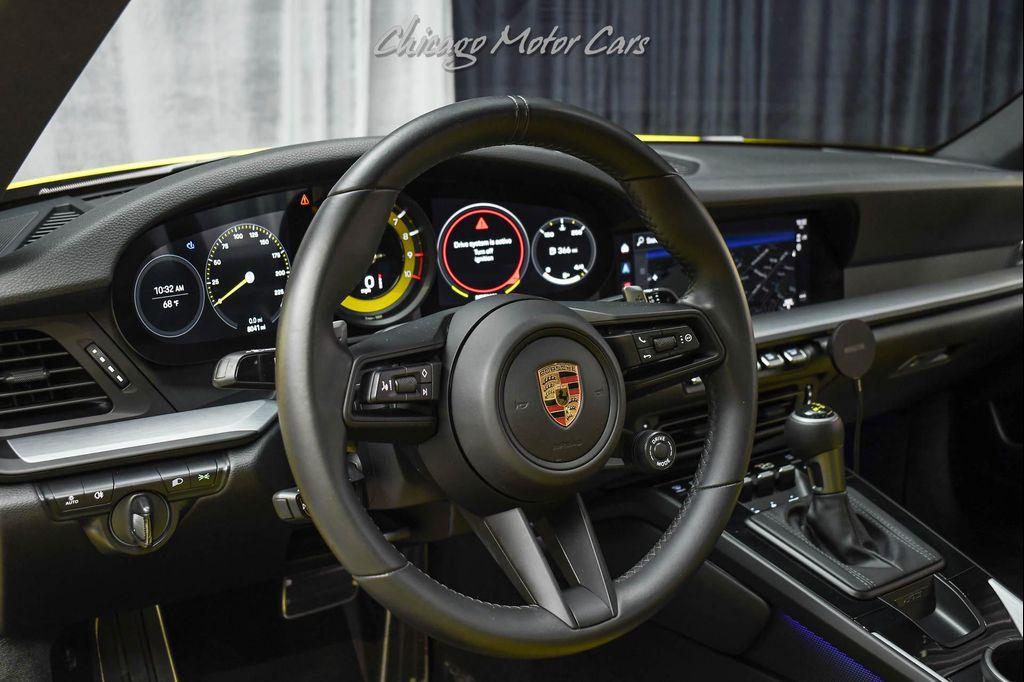 used 2023 Porsche 911 car, priced at $279,800