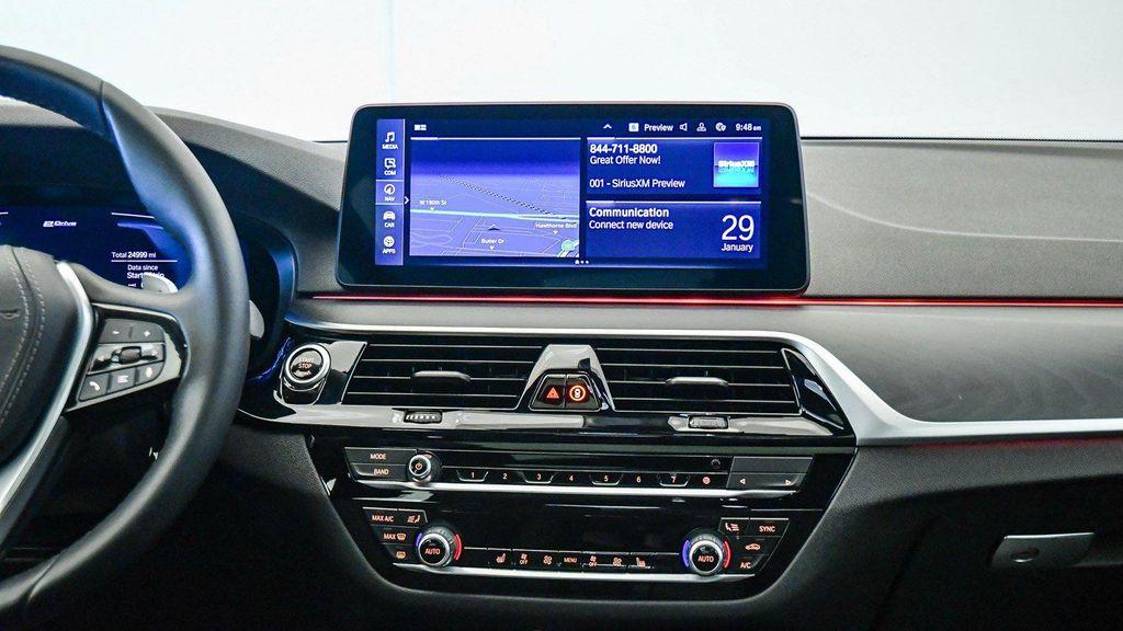 used 2023 BMW 530e car, priced at $34,009