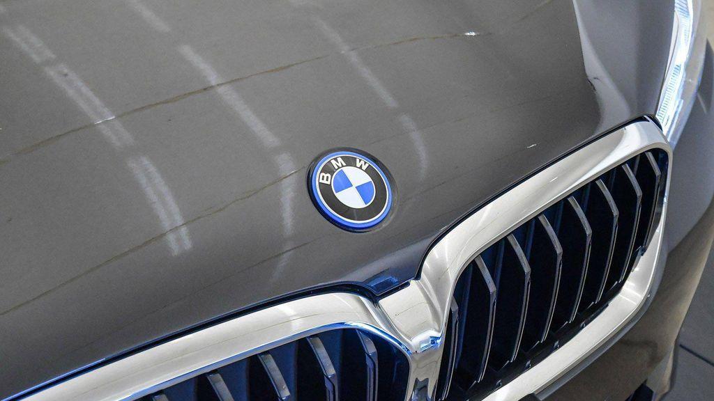 used 2023 BMW 530e car, priced at $34,009
