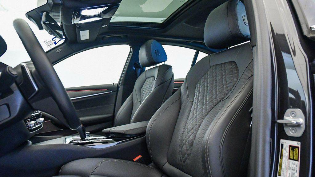 used 2023 BMW 530e car, priced at $34,009