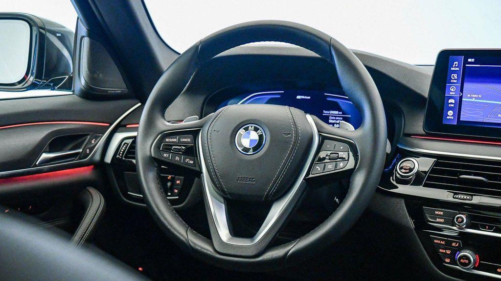 used 2023 BMW 530e car, priced at $34,009