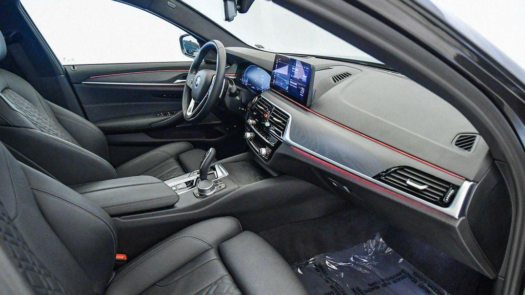 used 2023 BMW 530e car, priced at $34,009