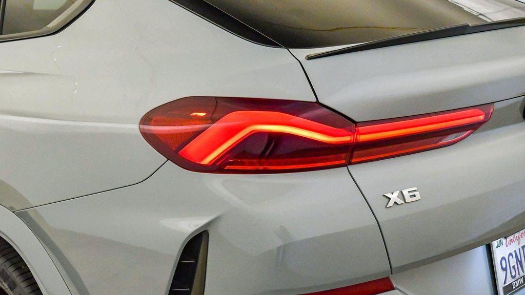 used 2024 BMW X6 car, priced at $65,916