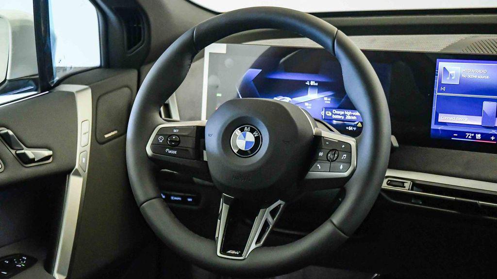 new 2026 BMW iX car, priced at $88,020