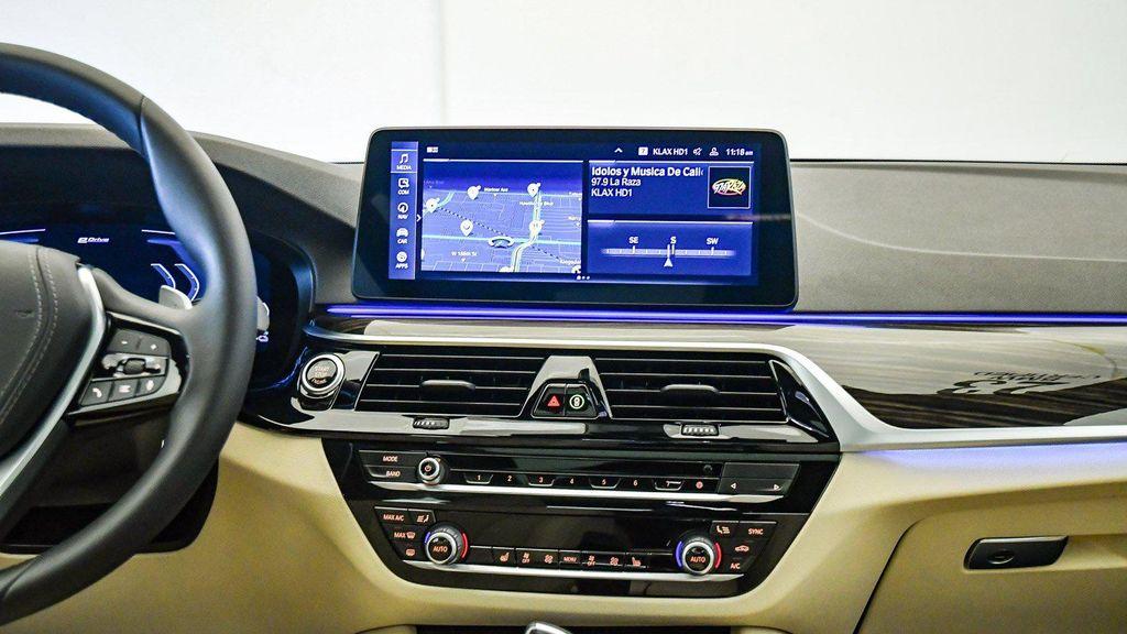 used 2023 BMW 530e car, priced at $34,134