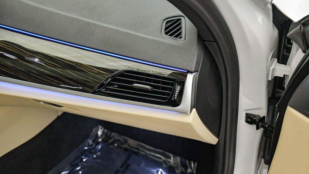 used 2023 BMW 530e car, priced at $33,149