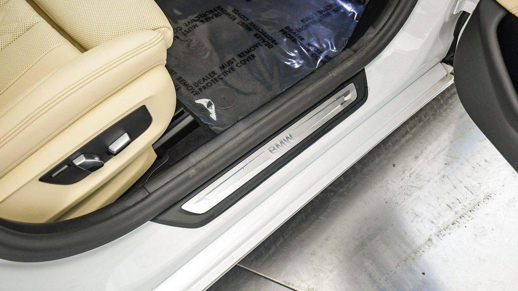 used 2023 BMW 530e car, priced at $34,134