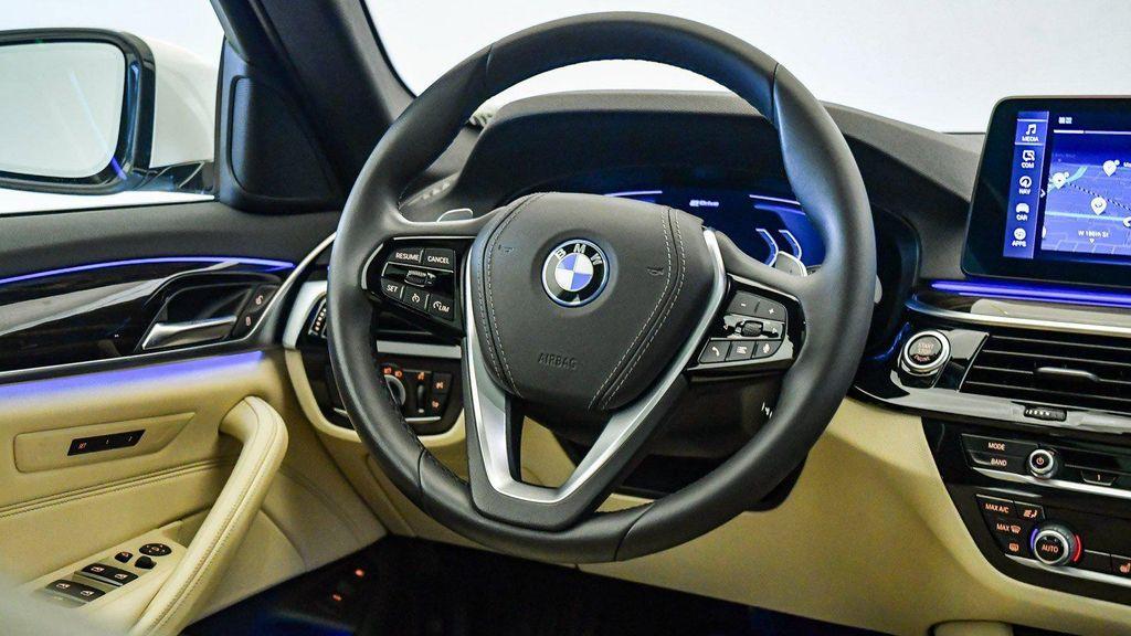 used 2023 BMW 530e car, priced at $33,149