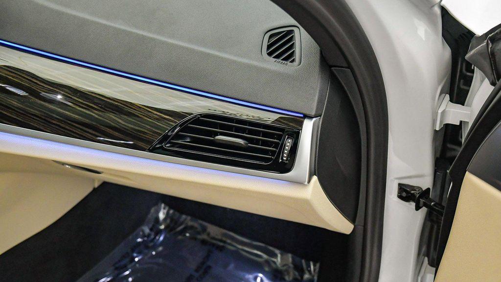 used 2023 BMW 530e car, priced at $34,134