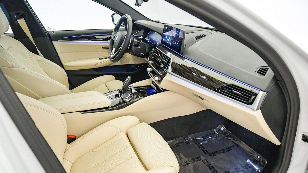 used 2023 BMW 530e car, priced at $34,134