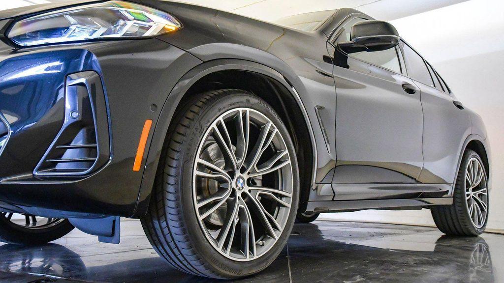 used 2023 BMW X4 car, priced at $39,782