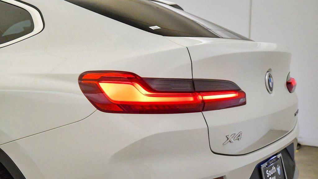 used 2023 BMW X4 car, priced at $40,876