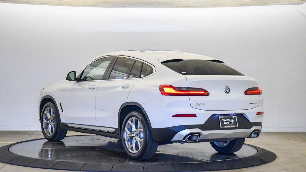 used 2023 BMW X4 car, priced at $40,876