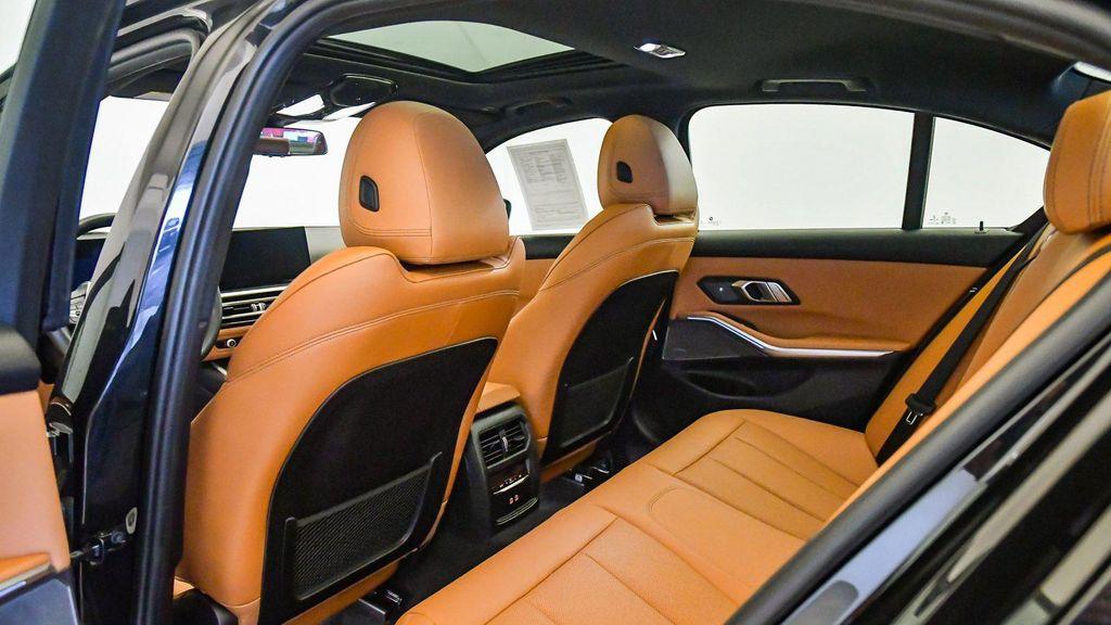 used 2023 BMW 330e car, priced at $31,999