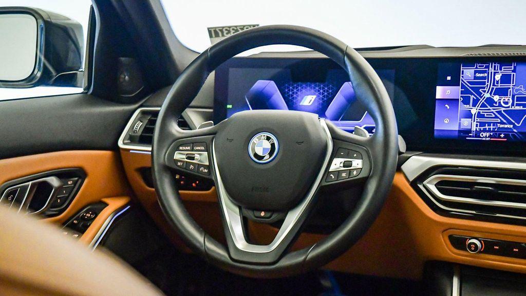 used 2023 BMW 330e car, priced at $31,999