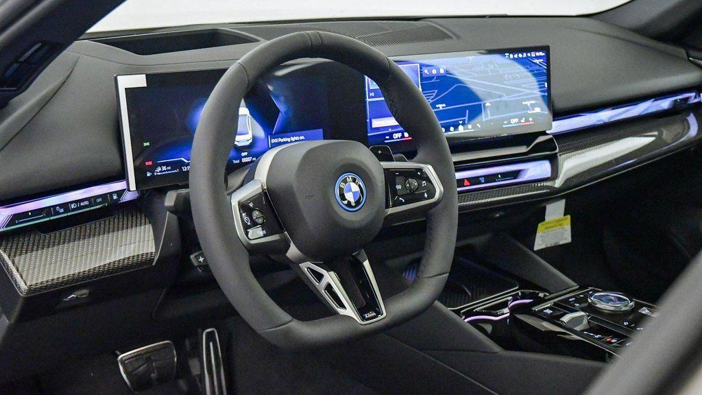 new 2026 BMW 550e car, priced at $90,900