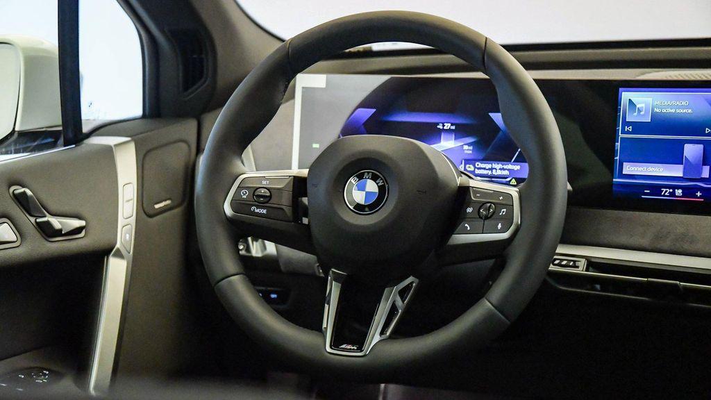 new 2026 BMW iX car, priced at $88,020