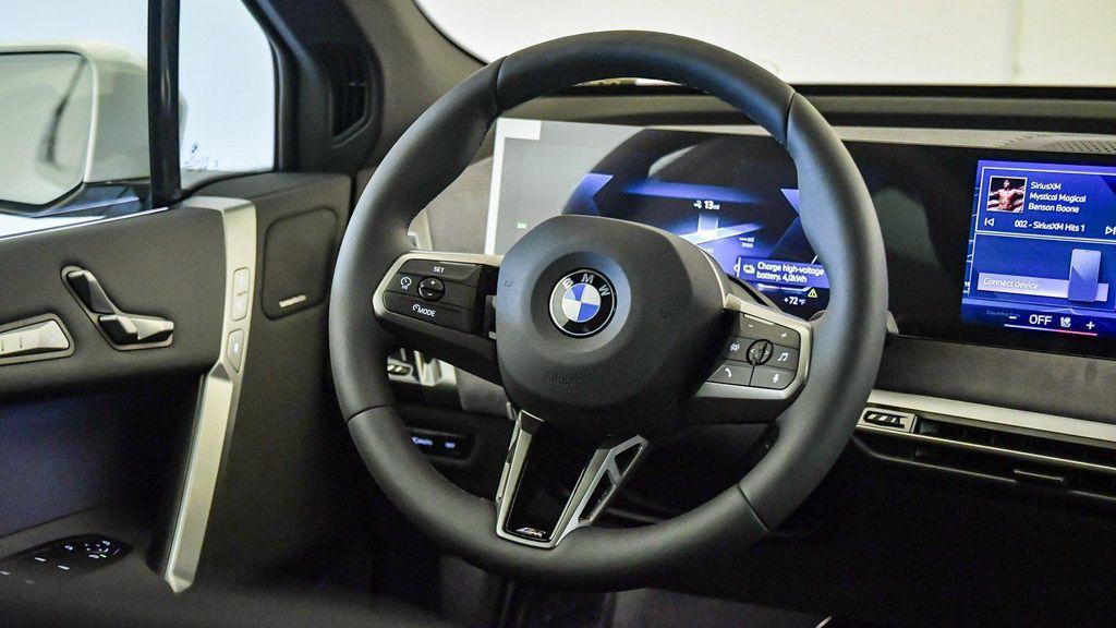 new 2026 BMW iX car, priced at $77,875