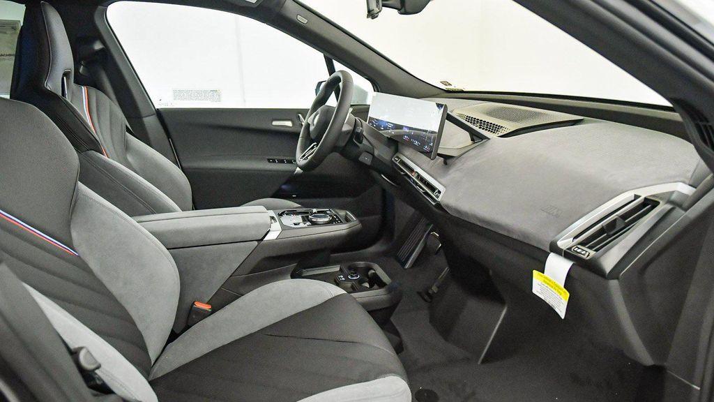 new 2026 BMW iX car, priced at $77,875