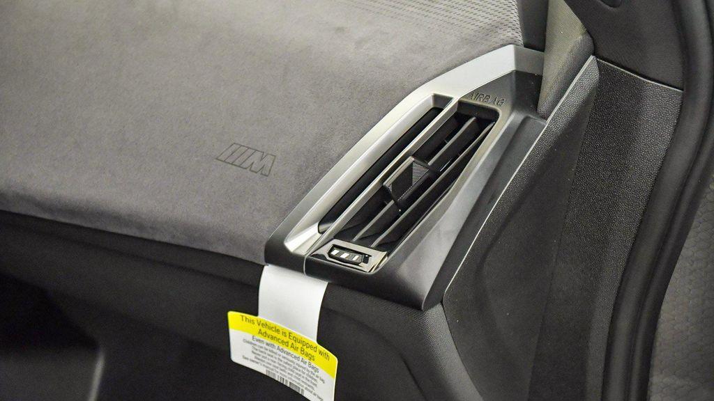 new 2026 BMW iX car, priced at $77,875