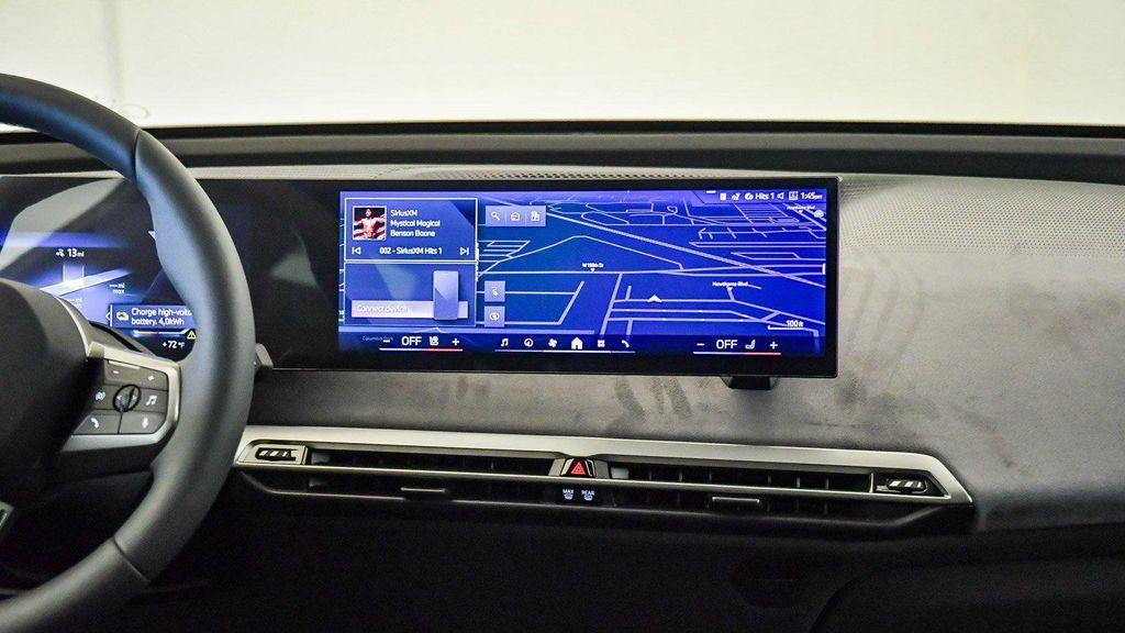 new 2026 BMW iX car, priced at $77,875