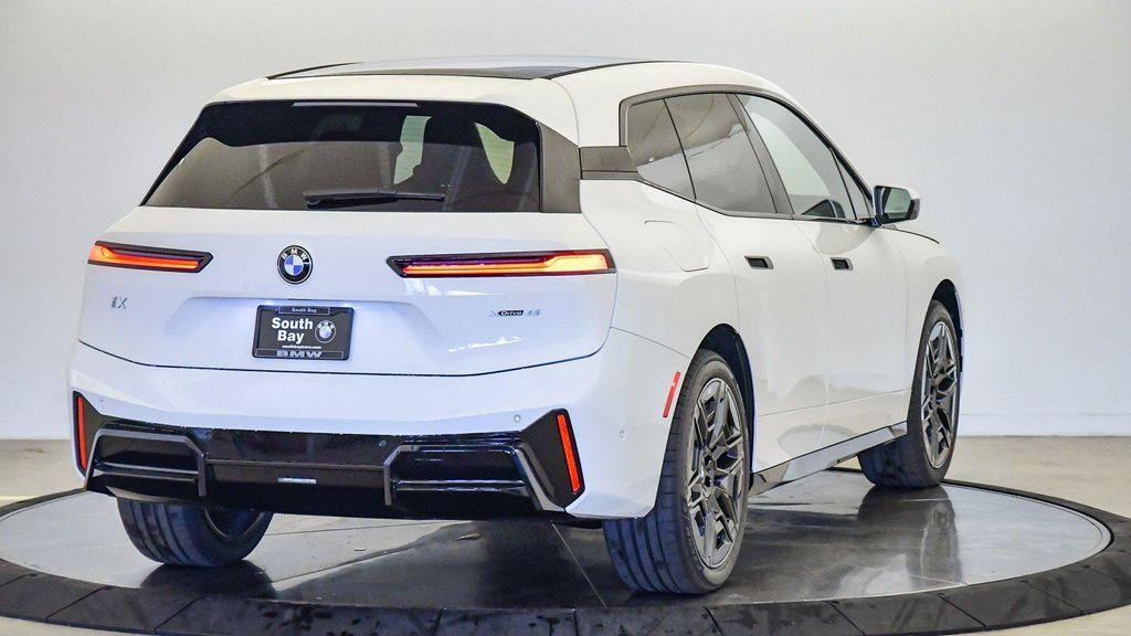 new 2026 BMW iX car, priced at $77,875