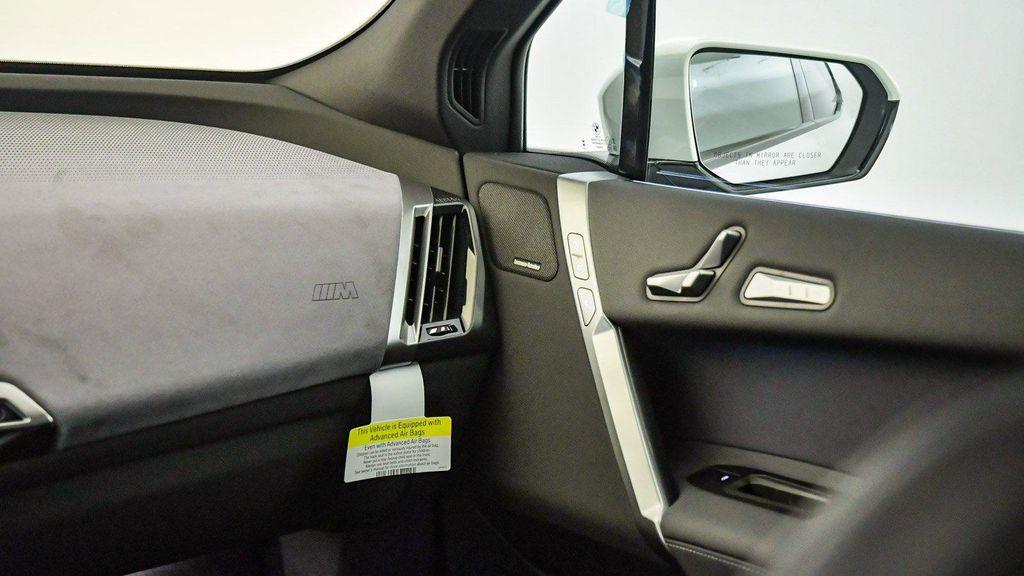 new 2026 BMW iX car, priced at $77,875