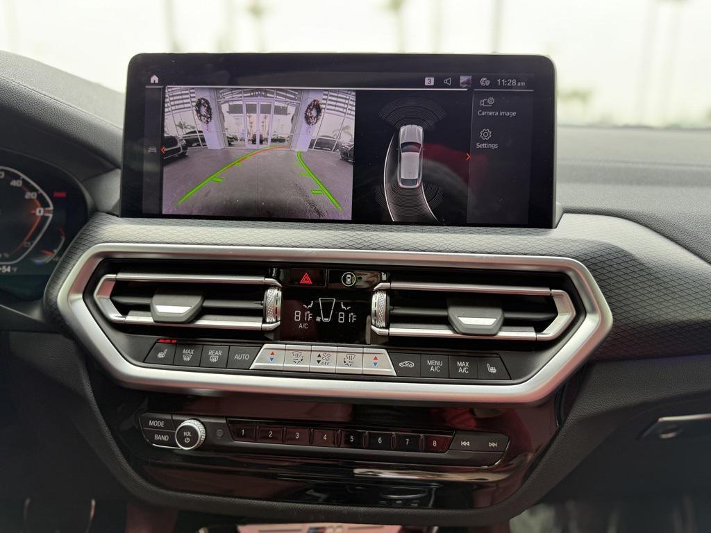 used 2023 BMW X4 car, priced at $54,990