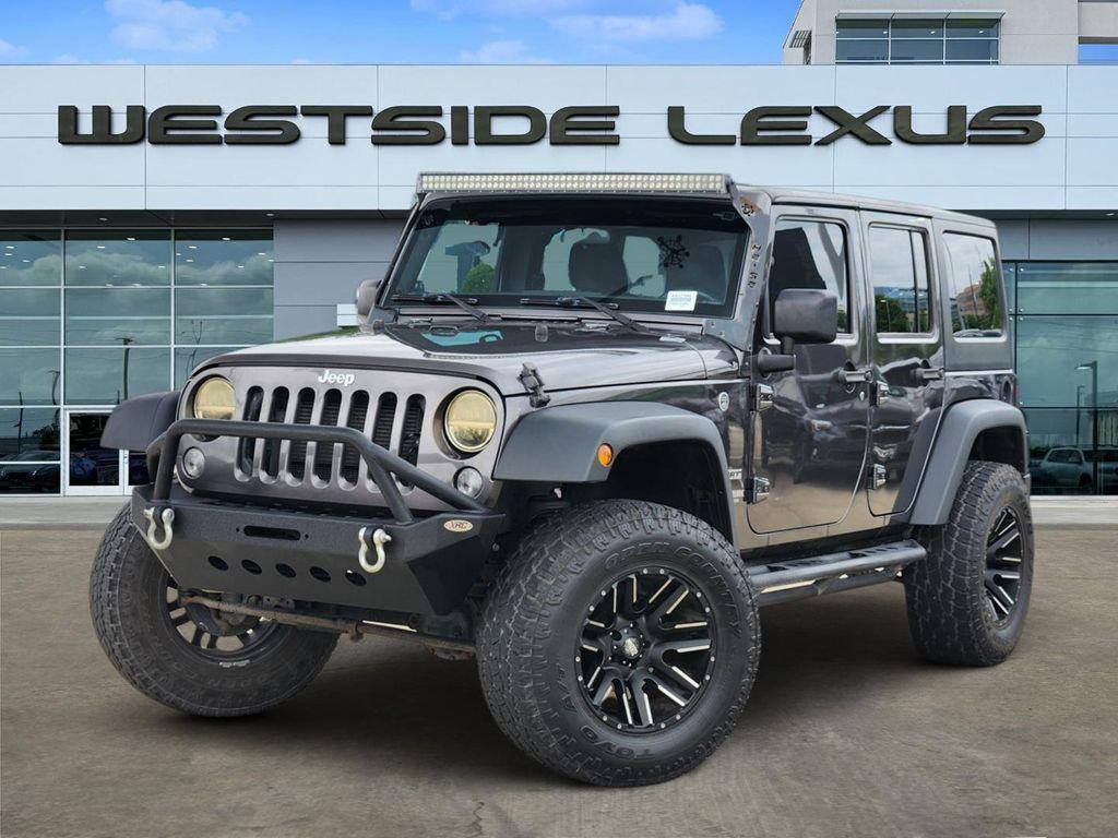 used 2018 Jeep Wrangler JK Unlimited car, priced at $23,888