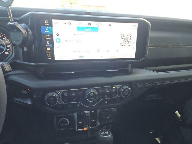 used 2024 Jeep Wrangler car, priced at $40,120