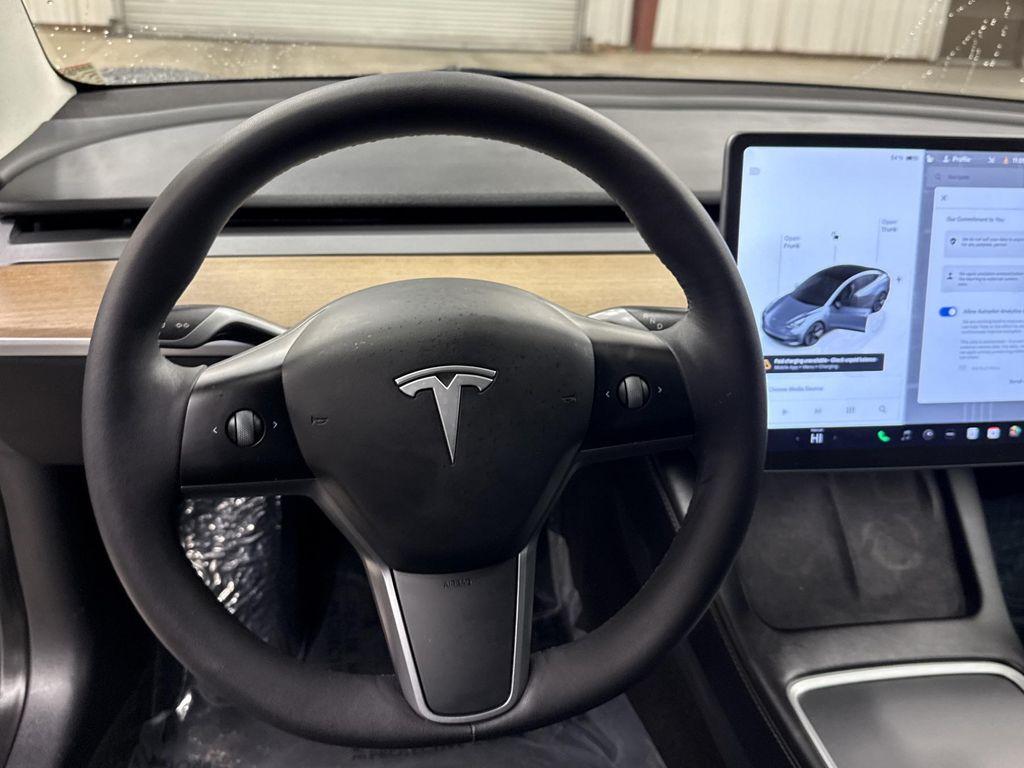 used 2023 Tesla Model 3 car, priced at $26,997