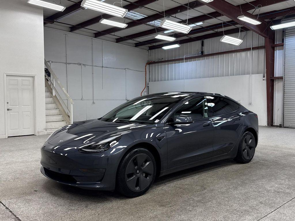 used 2023 Tesla Model 3 car, priced at $27,497