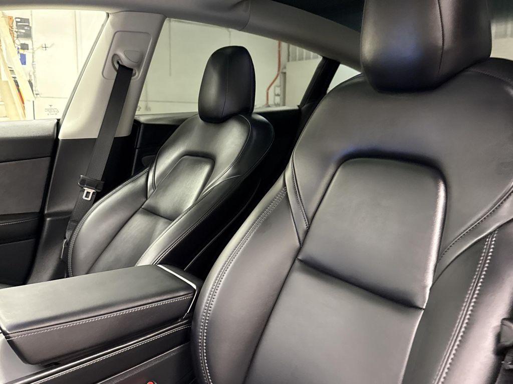 used 2023 Tesla Model 3 car, priced at $27,497