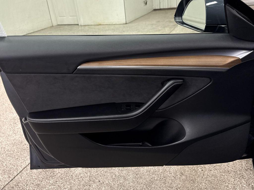 used 2023 Tesla Model 3 car, priced at $27,497
