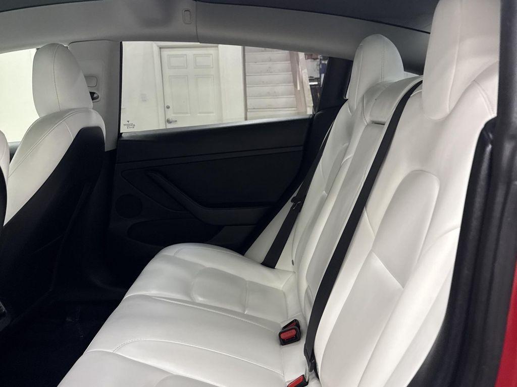 used 2023 Tesla Model 3 car, priced at $28,497