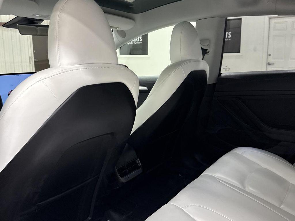 used 2023 Tesla Model 3 car, priced at $28,497