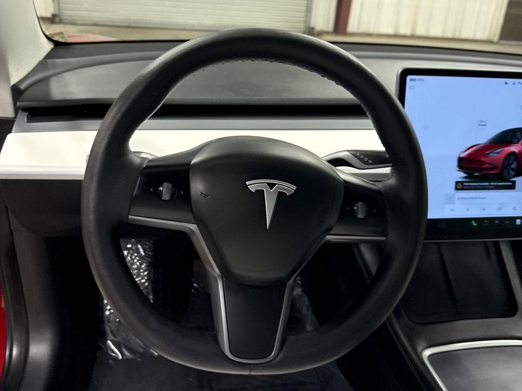 used 2023 Tesla Model 3 car, priced at $28,497