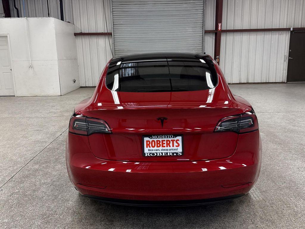 used 2023 Tesla Model 3 car, priced at $28,497