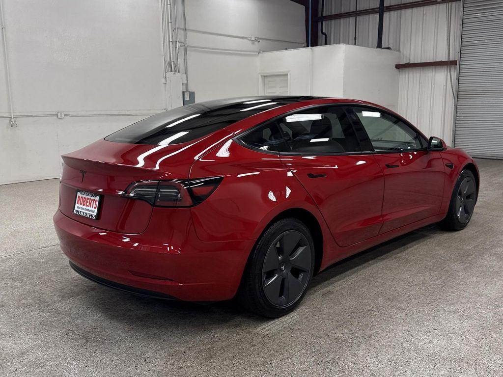 used 2023 Tesla Model 3 car, priced at $28,497
