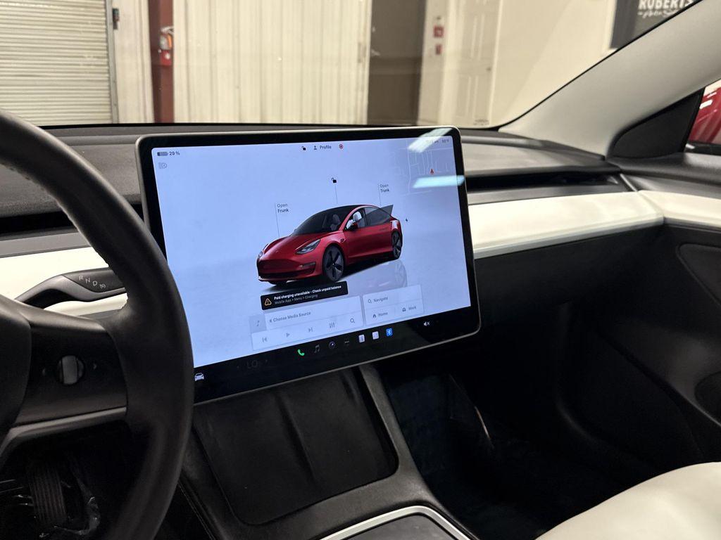 used 2023 Tesla Model 3 car, priced at $28,497